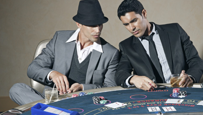 men in suits in a casino